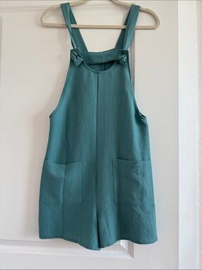 Teal Sleeveless Romper with Front Pockets